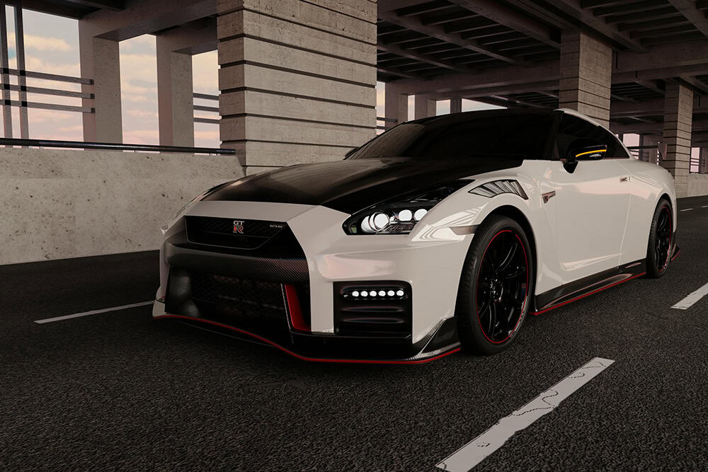 White Nissan GTR driving on highway